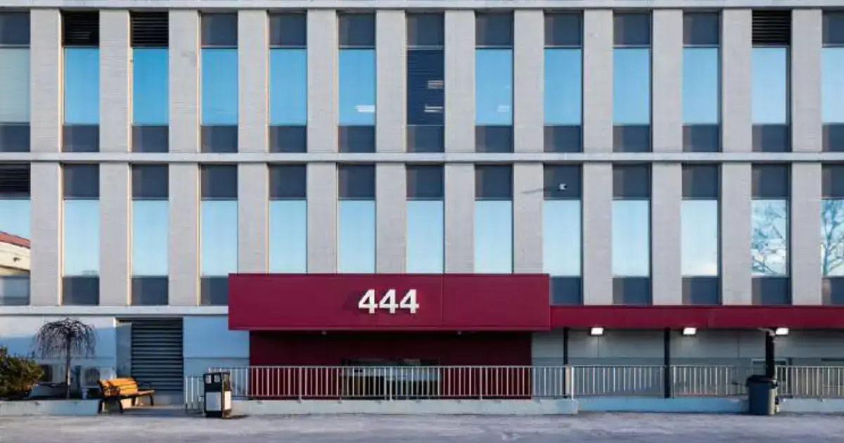 corporate building with 444 heading